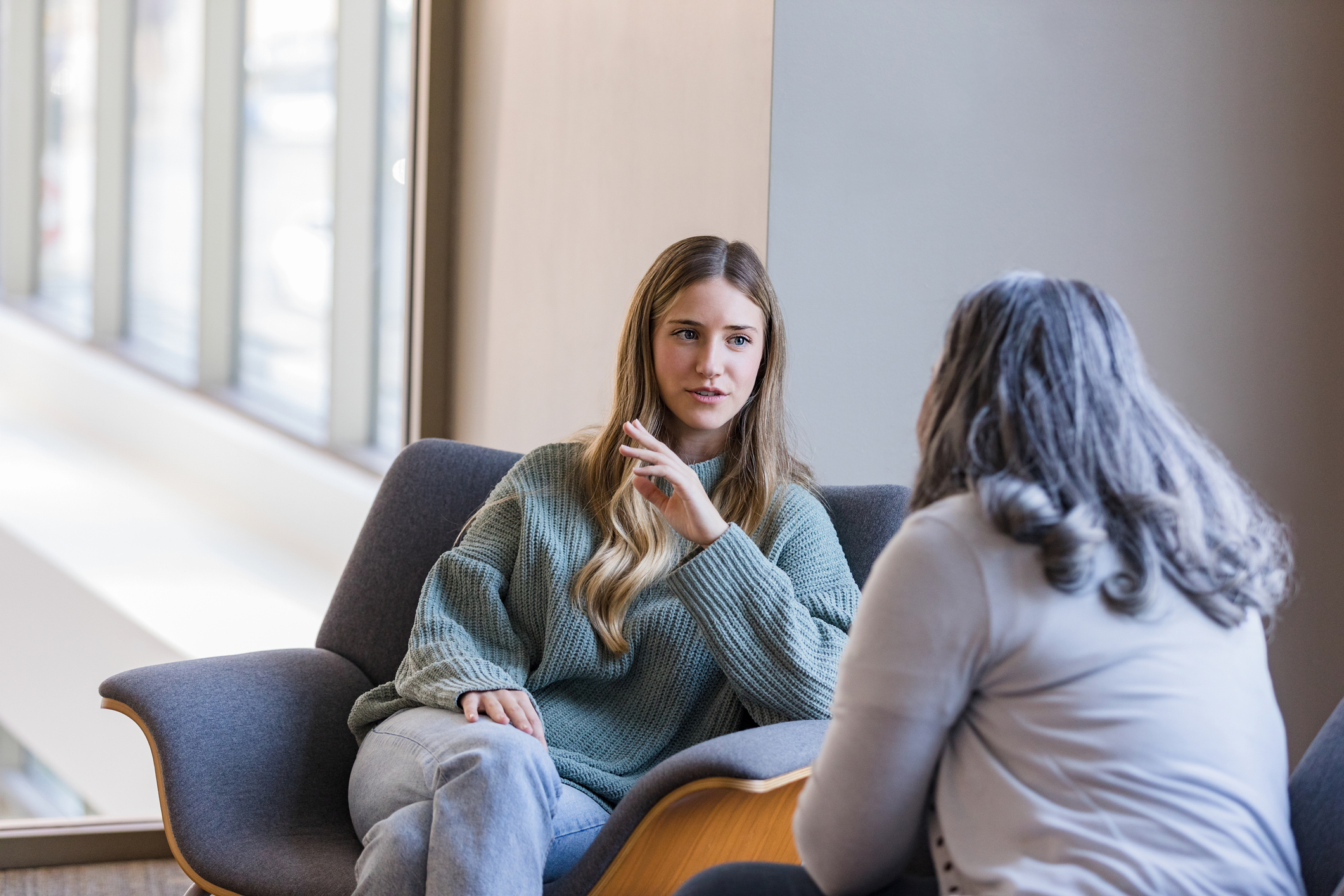 Conversation between two people in a calm setting